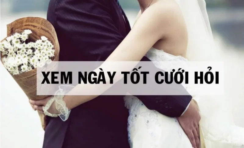 alt text: Cô dâu chú rể đang xem ngày cưới hỏi